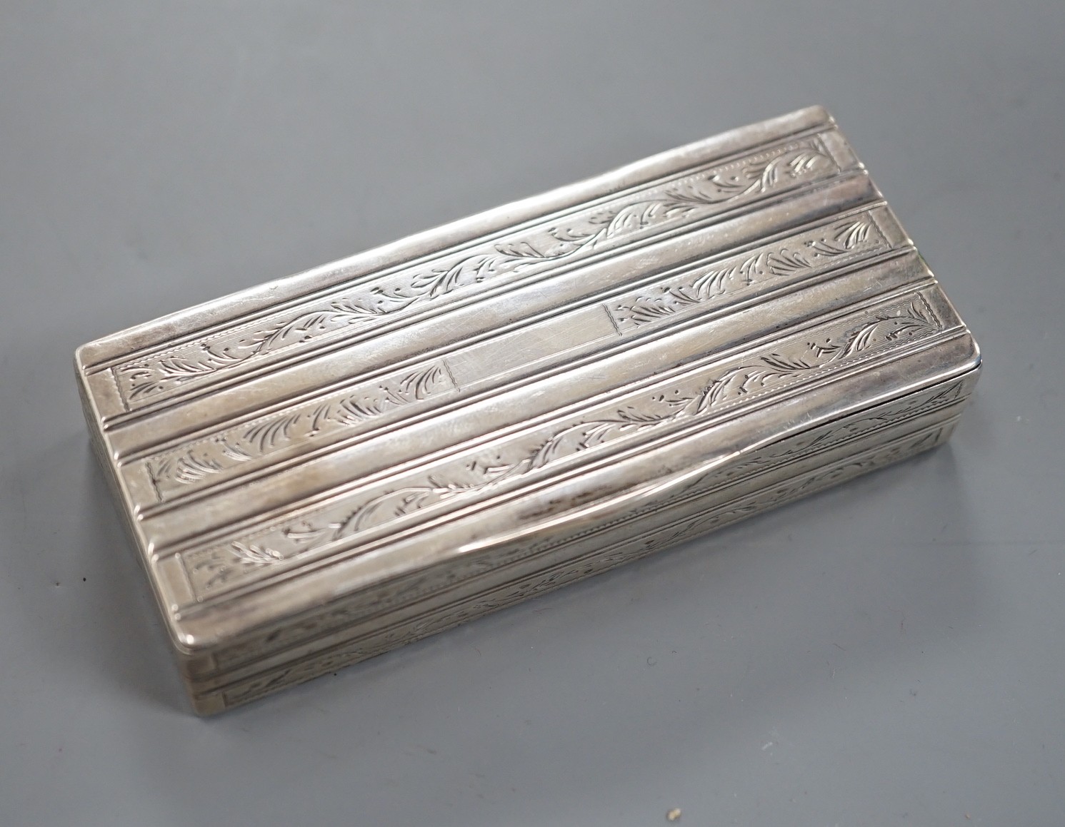 A mid 19th century Portuguese white metal rectangular snuff box, Oporto 1843-1853 mark, 87mm, 83 grams.